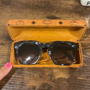 MCM unisex sunglasses with case.